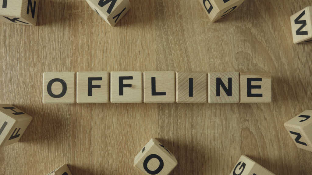 Offline word on wooden blocks on desk